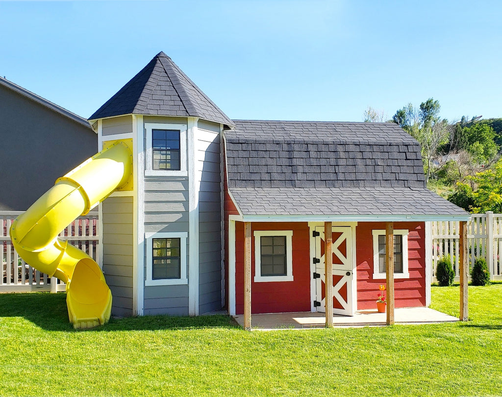 A red barn and silo playhouse for kids