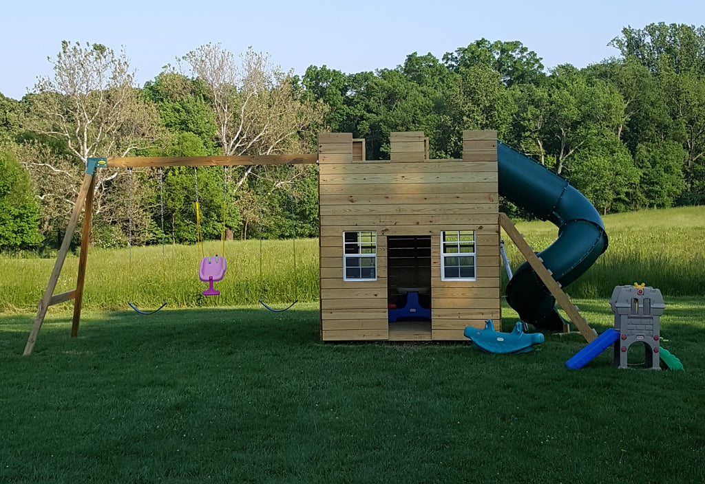 Castle play-set with a swing-set attachment