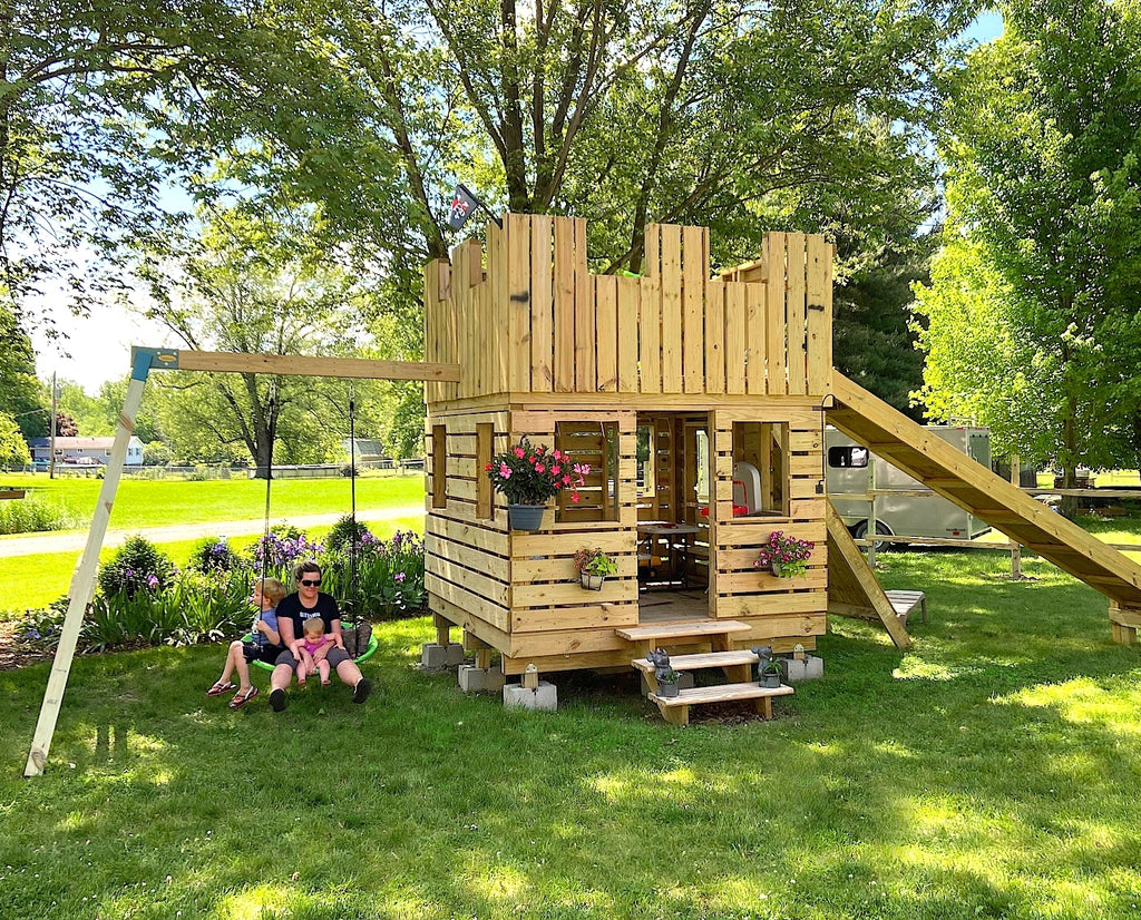 8x8 Castle Playhouse with swing set and flowers