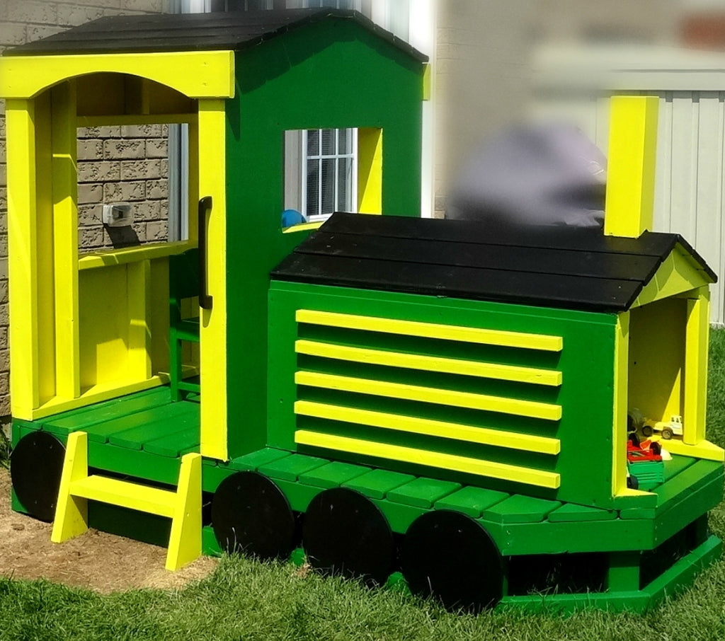 green and yellow wooden train play-set