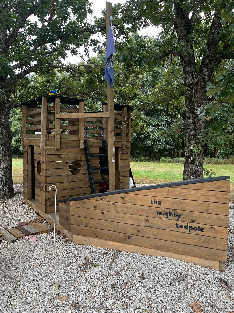 Simple wooden backyard pirateship playset.