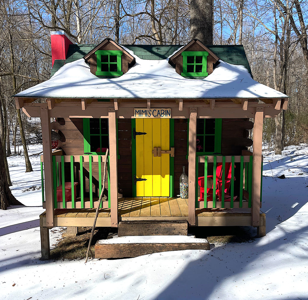 Log cabin playhouse in the snow