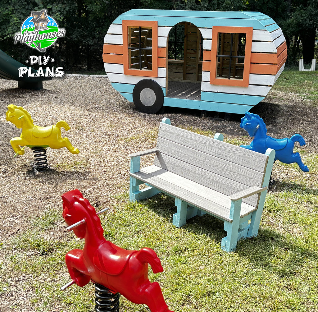 Wooden playhouse with striped design, bench, and colorful horse toys in a playground setting.