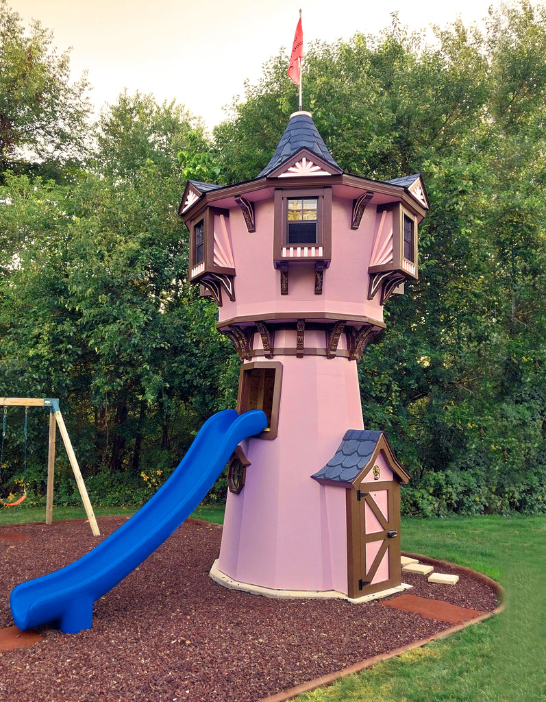 Children's Rapunzel's Tower playset with blue slide and ornate windows.