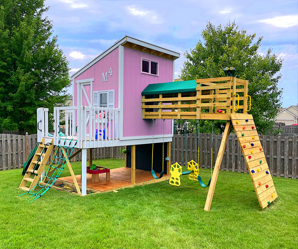 Pink kid's clubhouse with swingset and tunnel