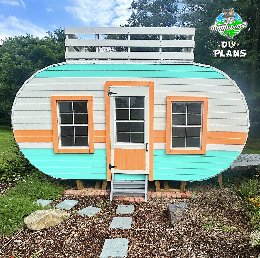 Cute wooden camper playhouse with loft
