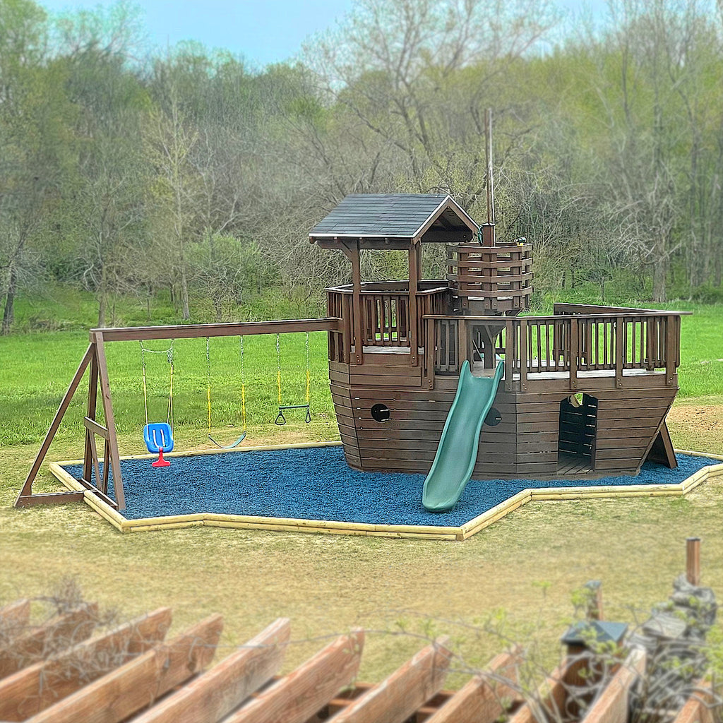 backyard pirate ship with crow's nest, slide and swingset
