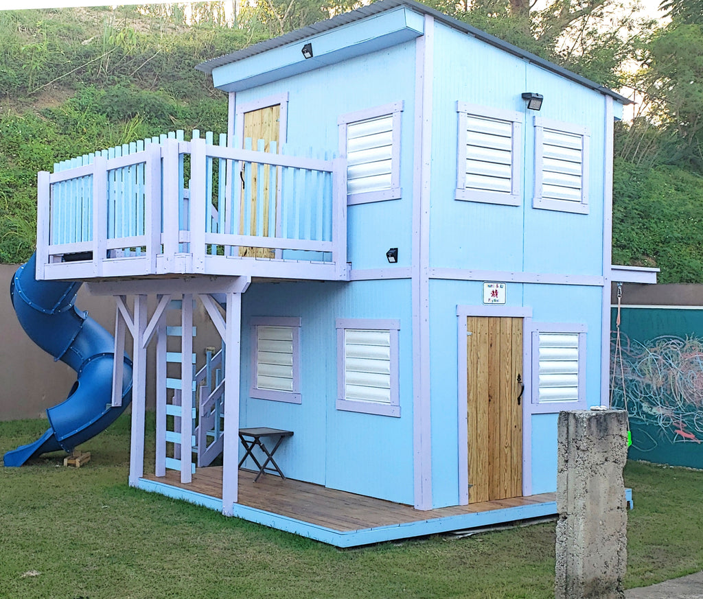 2 story blue playhouse with balcony