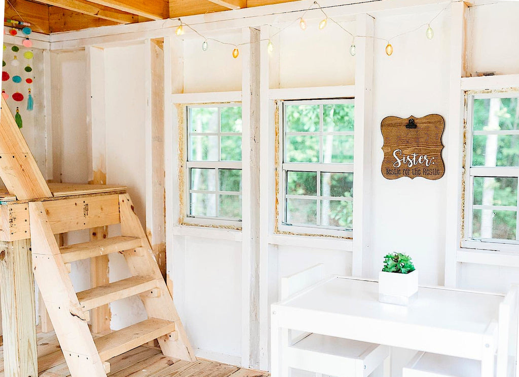 White inside of playhouse with ladder