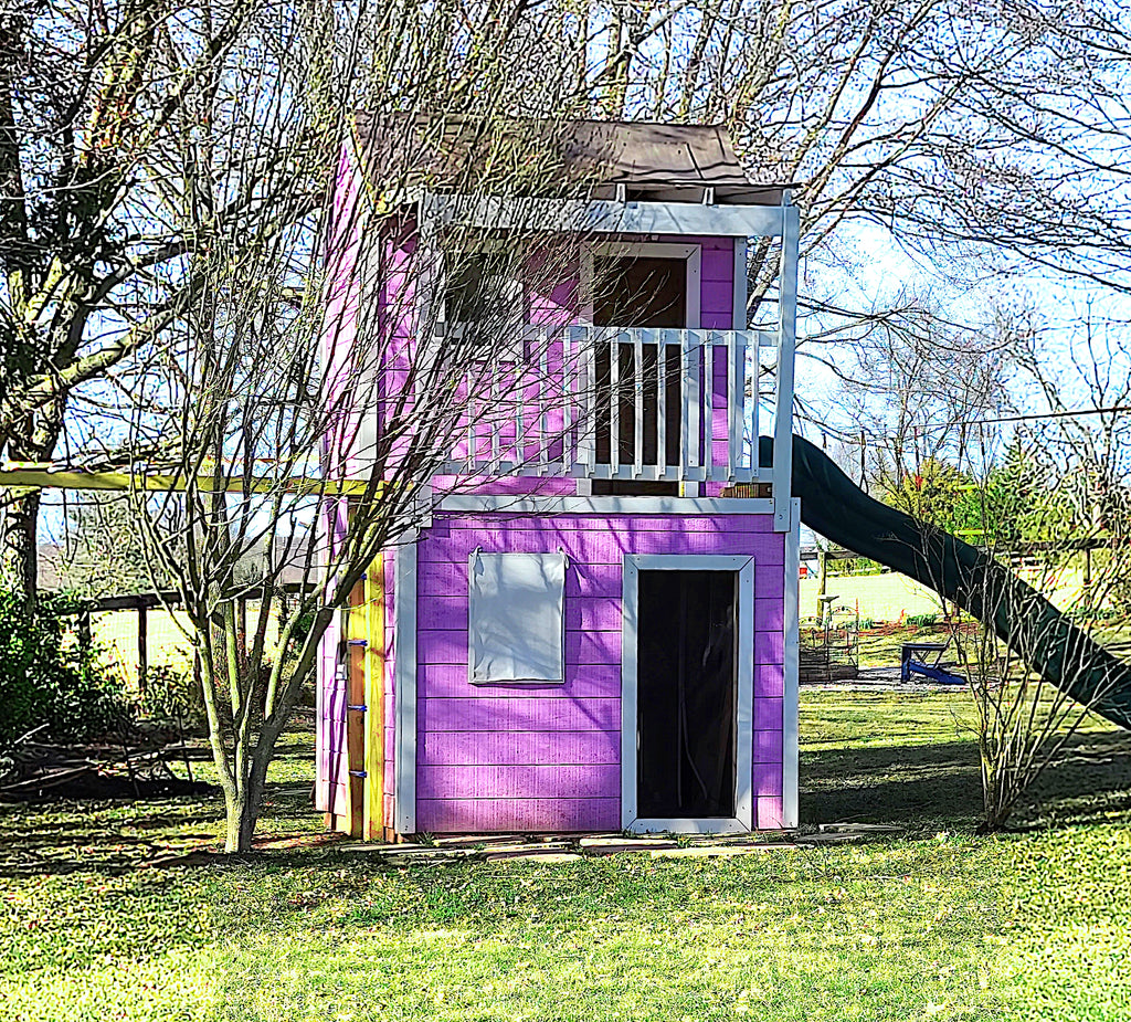 Purple, 2 story playhouse with patio, slide and swing set