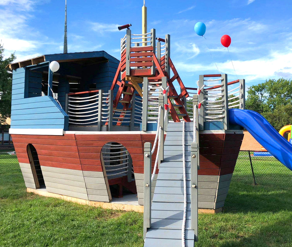 Blue and red layset pirate ship with crow's nest and balloons