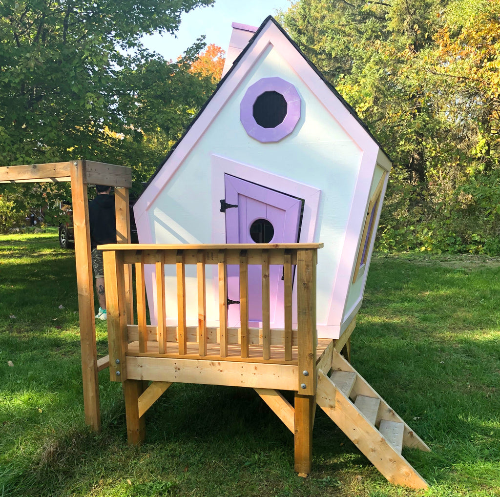 White and purple elevated whimsical playhouse