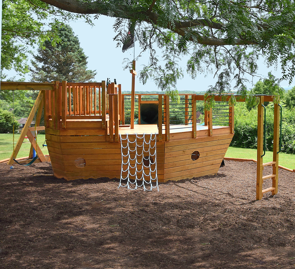Pirate ship playset in the mulch