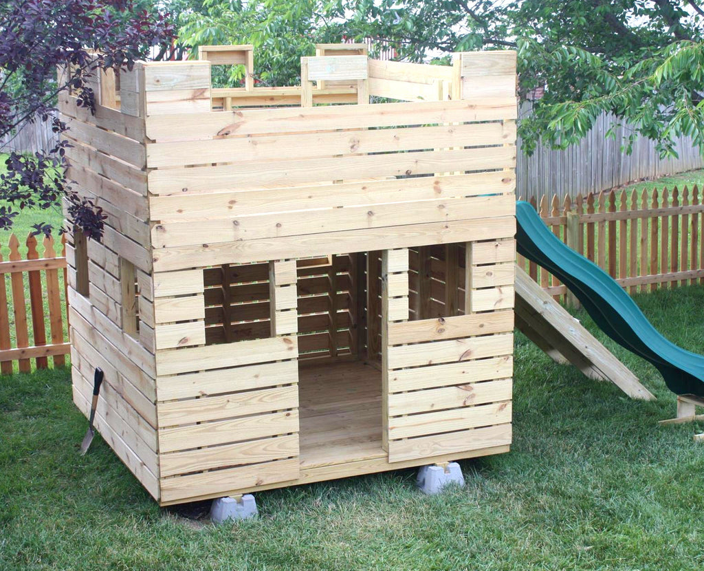 small wooden castle playhouse w/ slide and gang plank