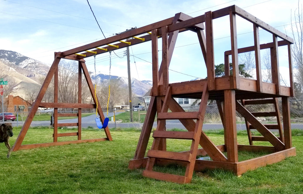 Backyard playset with mountains in view