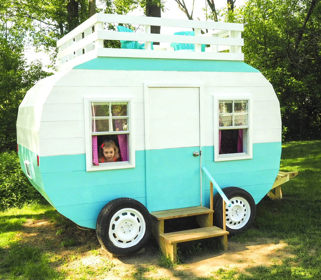 Wooden play-set camper with girl